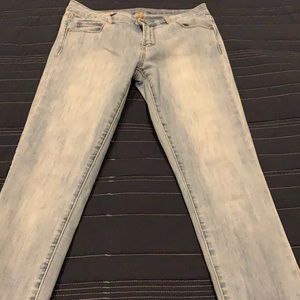 Woman’s fades blue jeans